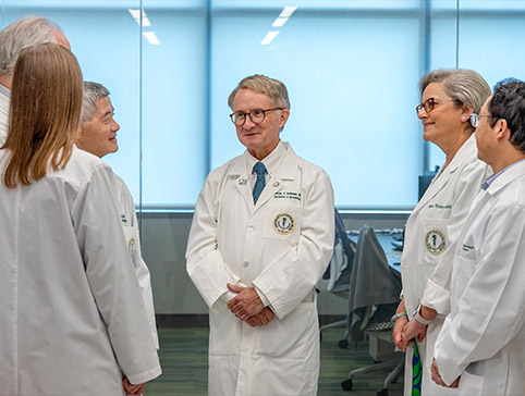 Doctor Charles Lockwood addresses college of medicine faculty.