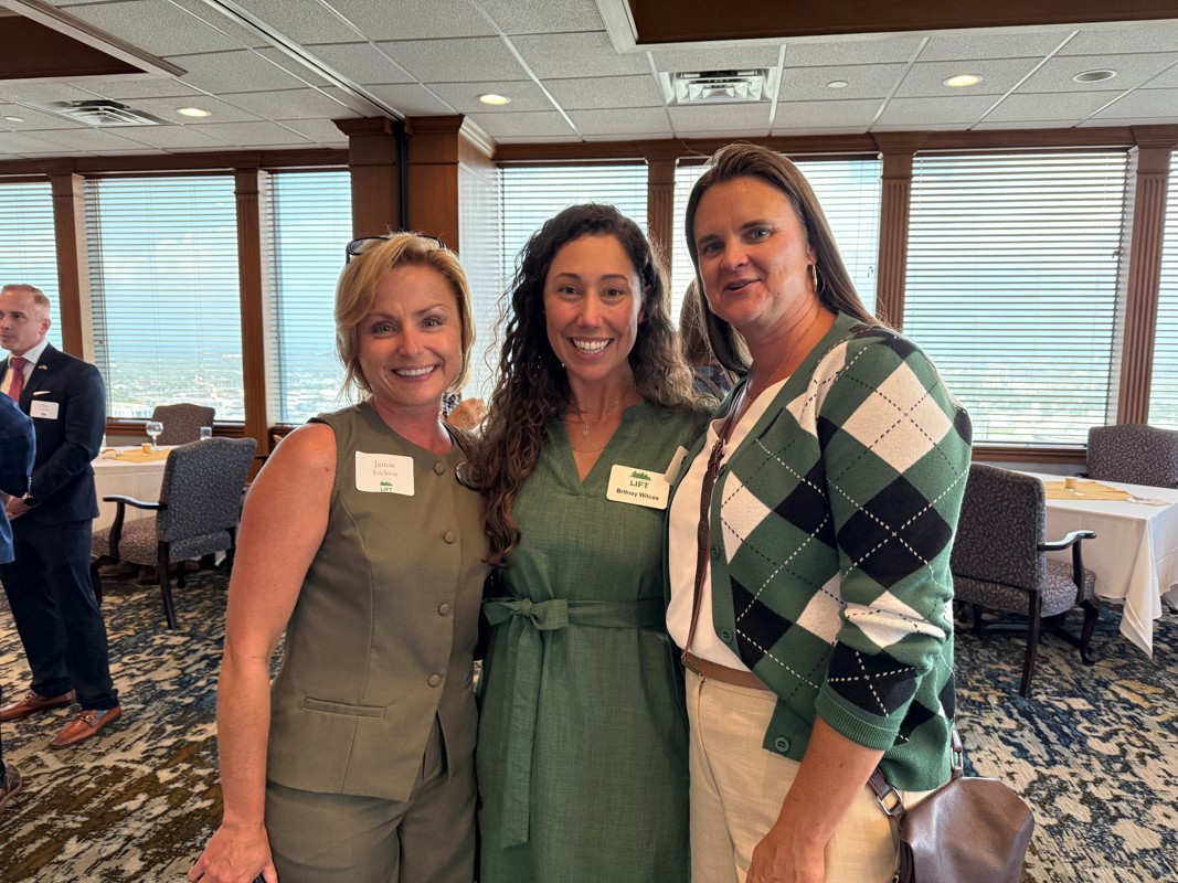 three ladies enjoying event 