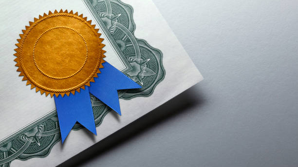 A certificate with a gold badge